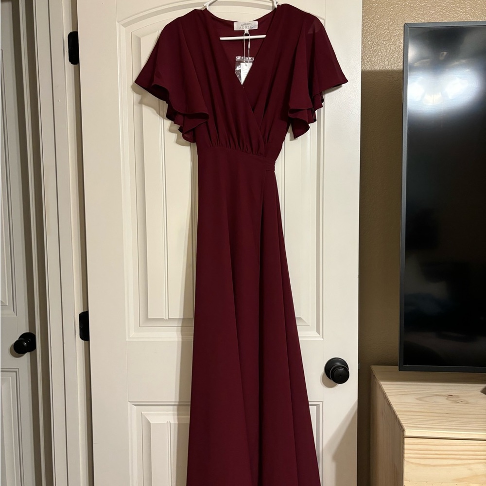 Called to surf flutter sleeve maxi dress.